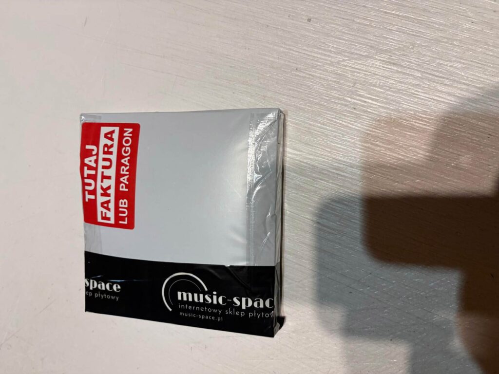 Mały foliopak music-space na płytę CD z naklejką „Tutaj faktura lub paragon